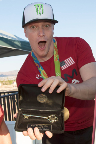BMX Olympic gold medalist Connor Fields, center, shows off his key after a celebration at the Whitney Mesa BMX Track on Tuesday, Aug. 30, 2016, in Henderson. Connor received a key to the city and  ...