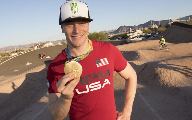 BMX Olympic gold medalist Connor Fields poses on the track following a celebration where Connor was honored with a key to the city and a proclamation at the Whitney Mesa BMX Track located at 1575 ...