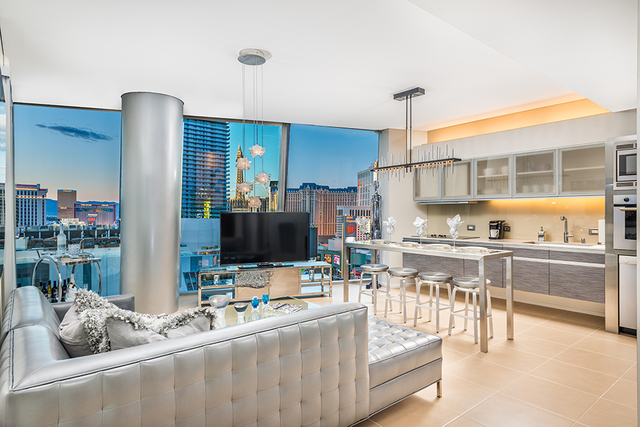 A residence for sale in the west tower of Veer Towers is found on the 12th floor where the wall between Unit 1202 and Unit 1203 has been torn down to combine the units into a custom 1,815-square-  ...