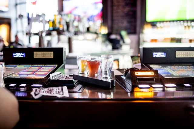 A selecton of in house craft beers displayed on a Nevada shaped platter are in the process of being consumed by guests at PT’s Brewing Company off of Tenaya Way and Cheyenne Avenue in Las Vegas ...