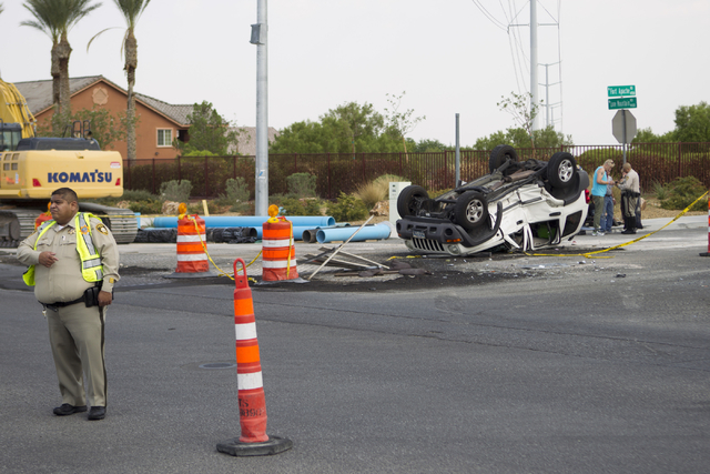 The scene of a two car crash at the intersection of North Fort Apache Road and West Lone Mountain Road is seen on Wednesday, Aug. 24, 2016, in Las Vegas. Erik Verduzco/Las Vegas Review-Journal Fol ...