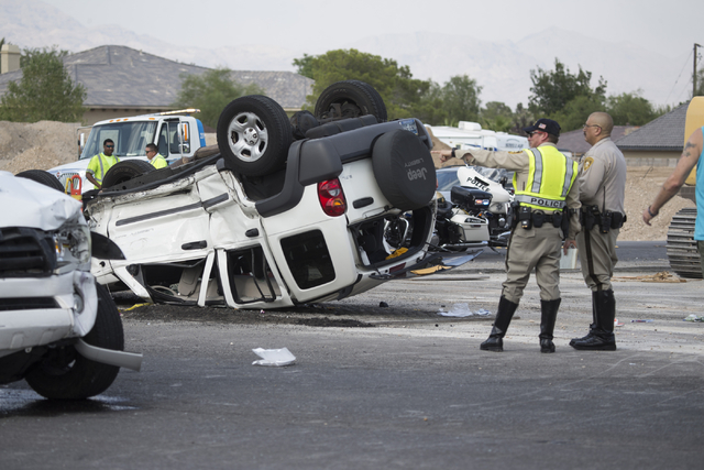 The scene of a two car crash at the intersection of North Fort Apache Road and West Lone Mountain Road is seen on Wednesday, Aug. 24, 2016, in Las Vegas. Erik Verduzco/Las Vegas Review-Journal Fol ...