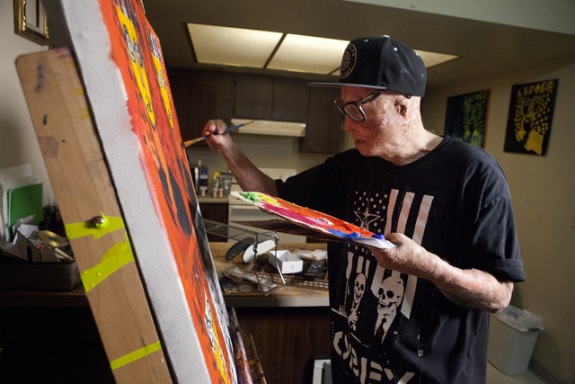 Artist Dave Dave works on his "Lifted" painting series at his Las Vegas apartment June 20. (Loren Townsley/View) Follow @lorentownsley on Twitter