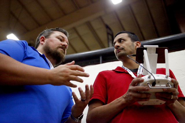 William OՄonnell, left, of AviSight Aerial and Drone Services, tutors Sam Zamarron of Irondale, Alabama during a drone pilot training course at the South Point Casino on on Thursday,  Aug. 25, 20 ...