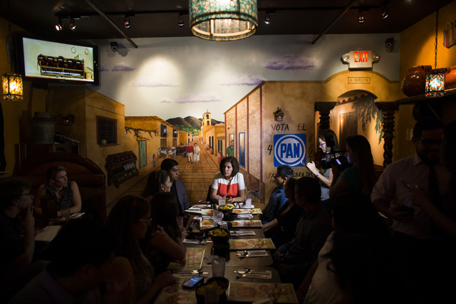 U.S. Senate Democratic candidate Catherine Cortez Masto talks about immigration during a lunch with DAPA and DACA eligible families at Lindo Michoacan in Las Vegas on Wednesday, Aug. 10, 2016. (Ch ...
