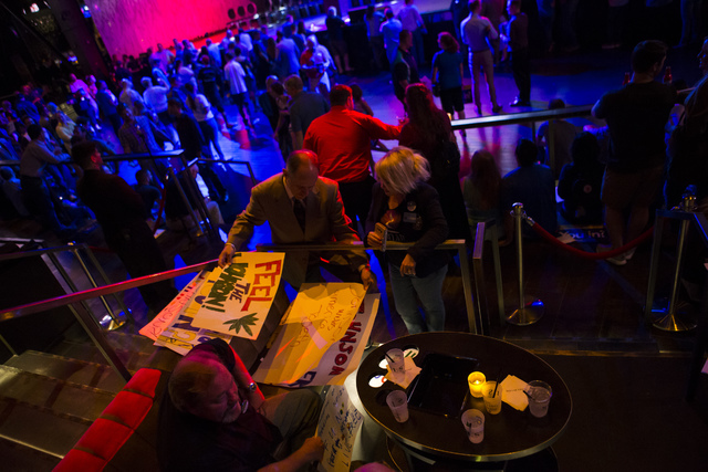 Supporters of Libertarian presidential candidate Gary Johnson gather signs for a campaign rally at the SLS hotel-casino in Las Vegas on Thursday, Aug. 18, 2016. Chase Stevens/Las Vegas Review-Jour ...
