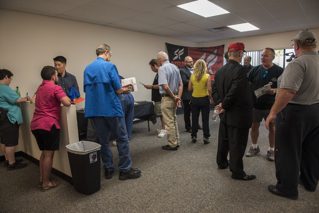 Volunteers and attendees are seen at the grand opening for a National Rifle Association campaign office at 6375 S. Pecos Road in Las Vegas Tuesday, Aug. 9, 2016. Martin S. Fuentes/Las Vegas Review ...