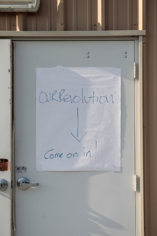 A signage showing the direction to the "Our Revolution" kickoff party is seen on the door at the Veterans of Foreign Wars Center, 4337 N Las Vegas Blvd., in Las Vegas, Wednesday, ...