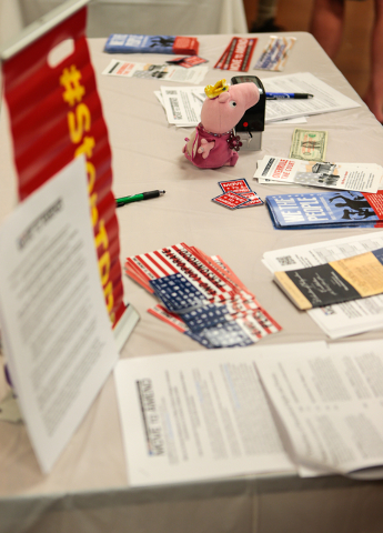 The Move to Amend information table is shown, at the &quot;Our Revolution&quot; kickoff party at the Veterans of Foreign Wars Center, 4337 N Las Vegas Blvd., in Las Vegas, Wednesday, Aug.  ...