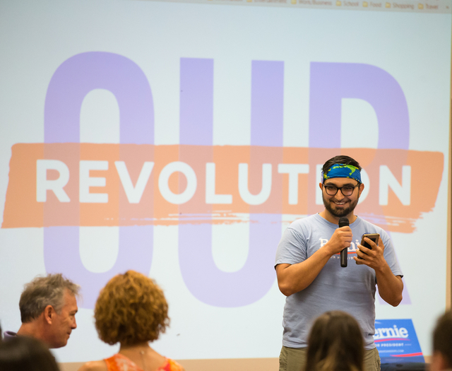 Green Party speaker Vincent Medina talks with attendees during the "Our Revolution" kickoff party at the Veterans of Foreign Wars Center, 4337 N Las Vegas Blvd, in Las Vegas, Wed ...