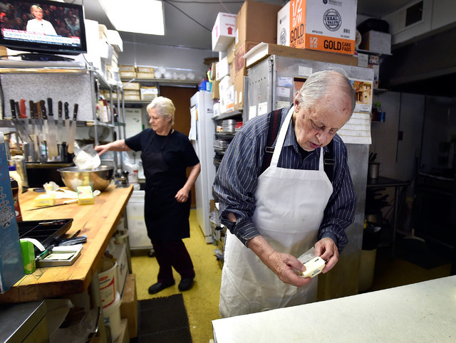 Ernie Feld, right, with his wife Marika nearby, prepares dough for a batch of challahs Wednesday, June 8, 2016, in Incline Village, Nev. The 91-year-old Feld continues to bake at his pastry shop n ...