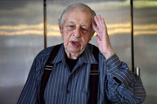 Ernie Feld gestures as he recalls his time as a baker during World War II at his pastry shop Wednesday, June 8, 2016, in Incline Village, Nev. The 91-year-old Feld continues to make his popular po ...