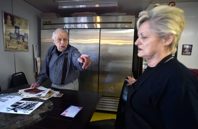 Ernie Feld, left, gives directions to his wife, Marika, at his Incline Village, Nev. bakery Wednesday, June 8, 2016. The 91-year-old Feld, who says his life was saved by his ability to bake, conti ...