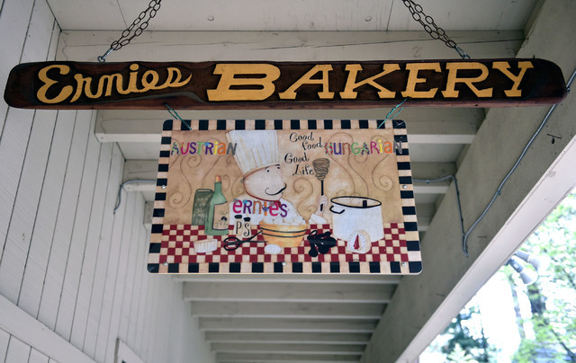A hanging sign is displayed in front of Ernie's International Pastries on Wednesday, June 8, 2016, in Incline Village, Nev. The 91-year-old Feld continues to bake at his pastry shop near the shore ...