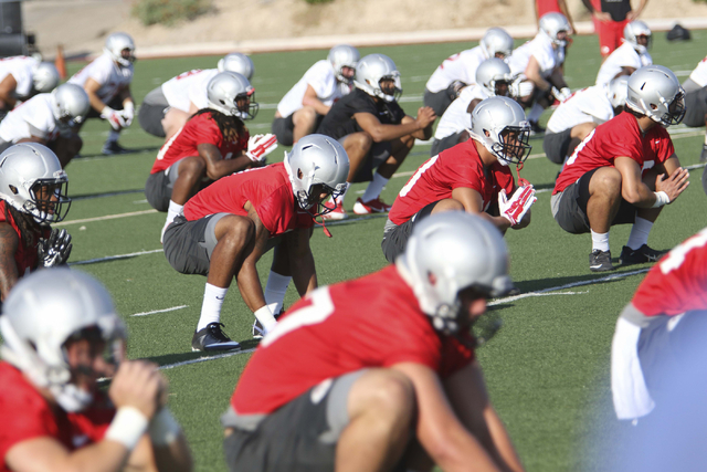 UNLV Rebels football players are seen during team practice at the Bill 'Wildcat' Morris Rebel Park field on Friday, Aug. 5, 2016. (Richard Brian/Las Vegas Review-Journal) Follow @vegasphotograph