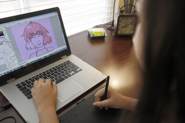 Amanda Galvan digitally draws an illustration at her home on Sunday, Aug. 21, 2016, in Las Vegas. (Rachel Aston/Las Vegas Review-Journal Follow @rookie__rae)