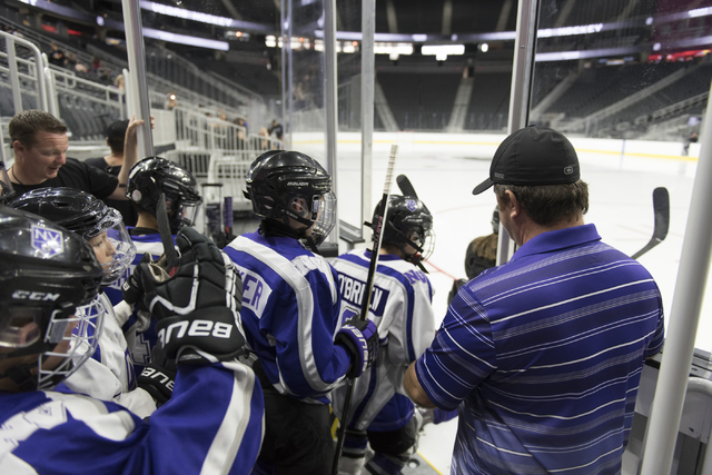 Members of the Storm Youth Hockey organization rush to skate on the newly installed ice at T-Mobile Arena in Las Vegas Wednesday, Aug. 3, 2016. Jason Ogulnik/Las Vegas Review-Journal