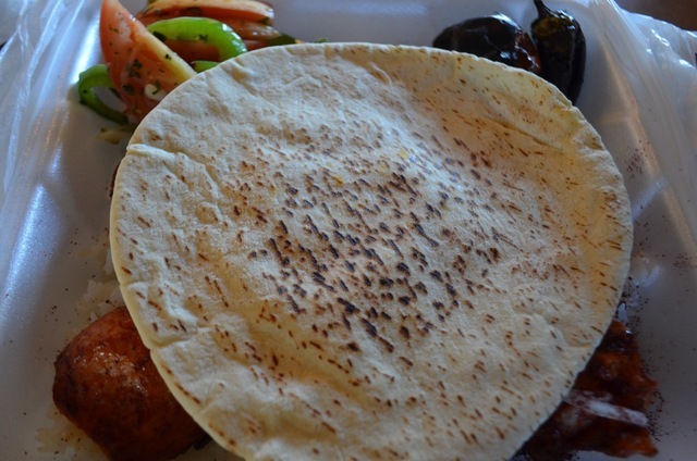 Kabob dishes packed to go are topped in a piece of warm pita bread at the Kabob Corner inside David Monte's New York Pizzeria, 5585 Simmons St. Ginger Meurer/View