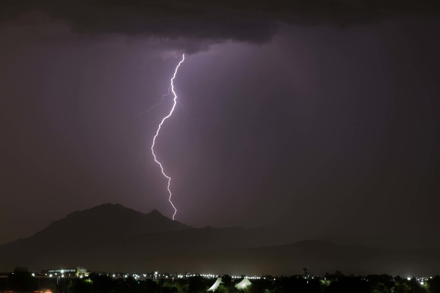 Lightning during thunderstorms in Henderson Monday night, Aug. 22, 2016. (Submitted by John McFie through AtTheScene)