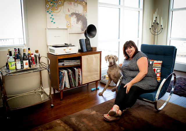 TONYA HARVEY/REAL ESTATE MILLIONS
Christine Carlson and Lord Fitzgerald — Fitz — her 15-month-old Weimaraner share an Ogden condo. (Tonya Harvey/Real Estate Millions)