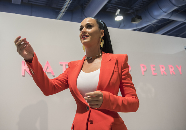 Musical artist Katy Perry waves to the crowd from her booth during the MAGIC trade show inside the Las Vegas Convention Center on Monday, Aug.15, 2016. Martin S. Fuentes/Las Vegas Review-Journal