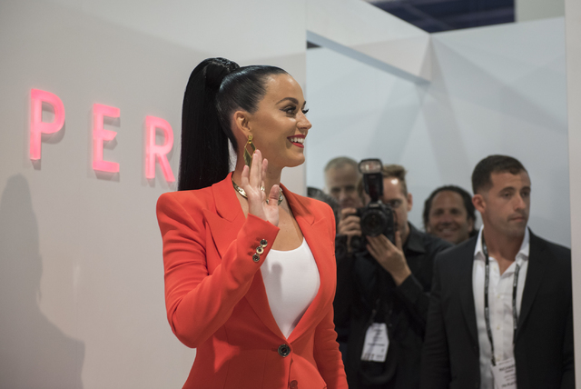 Musical artist Katy Perry waves to the crowd from her booth during the MAGIC trade show inside the Las Vegas Convention Center on Monday, Aug.15, 2016. Martin S. Fuentes/Las Vegas Review-Journal
