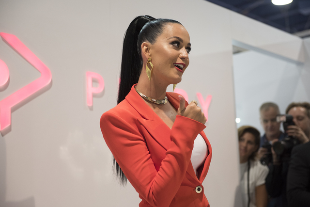 Musical artist Katy Perry greets the crowd from her booth during the MAGIC trade show inside the Las Vegas Convention Center on Monday, Aug.15, 2016. Martin S. Fuentes/Las Vegas Review-Journal