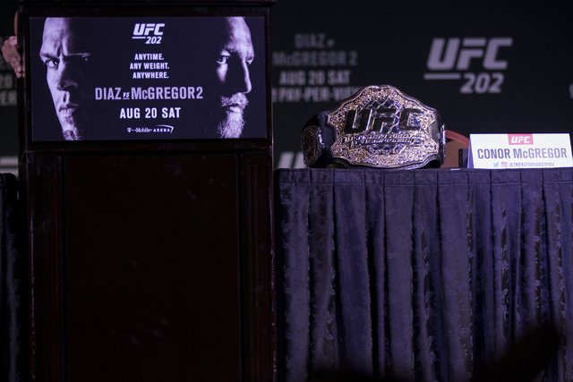 Conor McGregor's seat is seen before McGregor showing up late for the  UFC 202 press conference at the MGM Grand hotel-casino on Wednesday, Aug. 17, 2016, in Las Vegas. Erik Verduzco/Las Vegas Rev ...