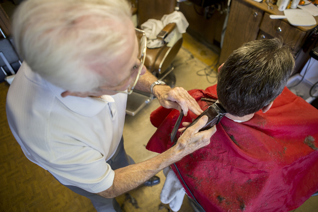Barber Jon Holten cuts a clients hair at New Image Barber & Styling, Wednesday, Aug. 17, 2016, in Las Vegas. Elizabeth Page Brumley/Las Vegas Review-Journal Follow @ELIPAGEPHOTO