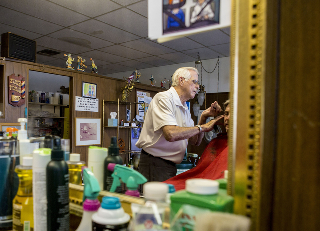 Barber Jon Holten cuts a clients hair at New Image Barber & Styling, Wednesday, Aug. 17, 2016, in Las Vegas. (Elizabeth Page Brumley/Las Vegas Review-Journal) Follow @ELIPAGEPHOTO