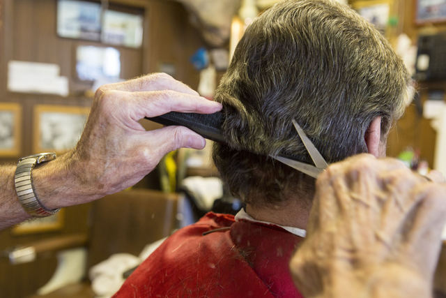 Barber Jon Holten cuts a client's hair at New Image Barber & Styling Wednesday, Aug. 17, 2016, in Las Vegas. (Elizabeth Page Brumley/Las Vegas Review-Journal) Follow @ELIPAGEPHOTO