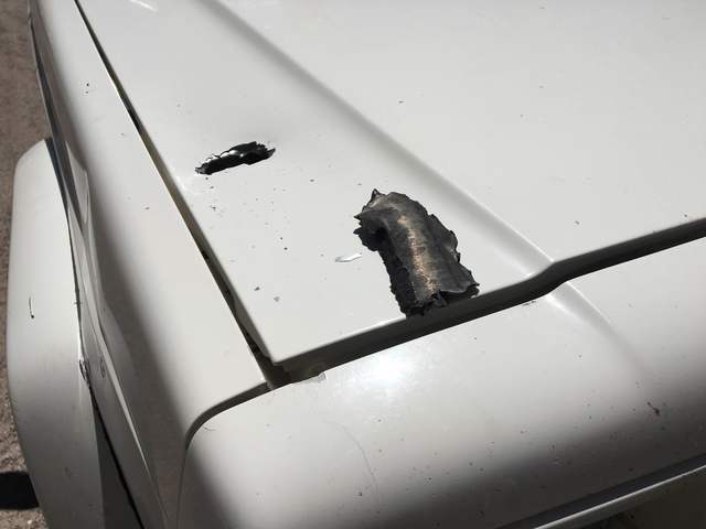 Shrapnel from an explosion tore into Myron Buescher’s truck Wednesday night, July 13, 2016, in his Panaca neighborhood. (Kimber Laux/Las Vegas Review-Journal)