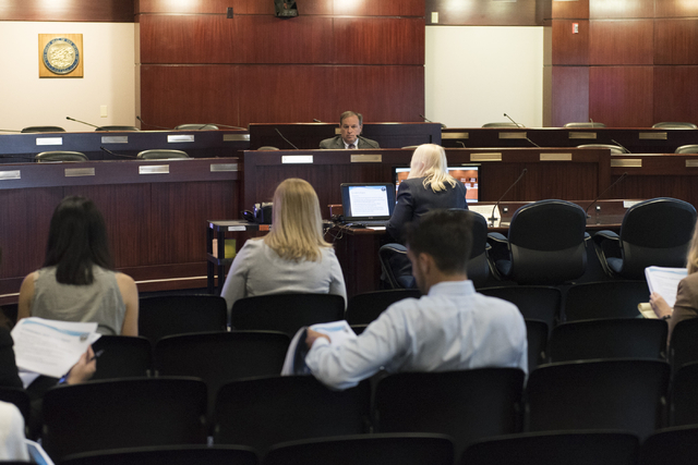 Nevada State Treasurer Dan Schwartz, top, hosts a public meeting on payday loans at the Sawyer Building in Las Vegas, Wednesday, Aug. 10, 2016. (Jason Ogulnik/Las Vegas Review-Journal)
