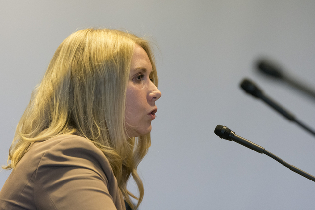 Tennille Pereira, attorney with the Legal Aid Center of Southern Nevada, speaks during a public meeting on payday loans at the Sawyer Building in Las Vegas, Wednesday, Aug. 10, 2016. (Jason Ogulni ...