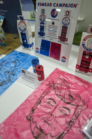 Pet waste bags featuring caricatured versions of presidential hopefuls sit on display during the SuperZoo Trade Show at the Mandalay Bay Convention Center on the Las Vegas Strip on Tuesday, Aug. 2 ...