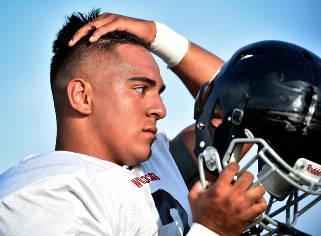 Las Vegas High linebacker Cruz Littlefield prepares to play a scrimmage against Green Valley at Green Valley High School Friday, Aug. 19, 2016, in Henderson. David Becker/Las Vegas Review-Journal ...