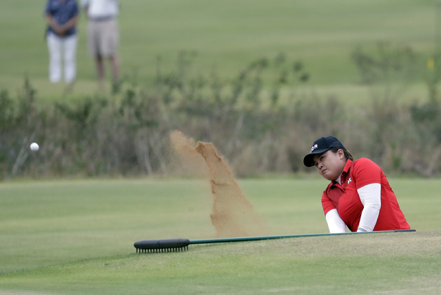 Inbee Park of South Korea, hits from a bunker on the 18th hole during the final round of the women's golf event at the 2016 Summer Olympics in Rio de Janeiro, Brazil, Saturday, Aug. 20, 2016.(AP P ...