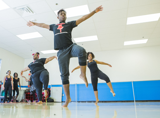 Dedrick Stewart, 21, center, performs contemporary dance moves at Studio 305 in North Las Vegas, home of R.A.G.E. (Reaching Above Greater Expectations), a program for at-risk kids founded by forme ...