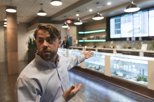 Jacob Silverstein, marketing director with Las Vegas ReLeaf, speaks with a reporter at the dispensary during a walking tour of various medical marijuana dispensaries in Las Vegas' "Green District" ...