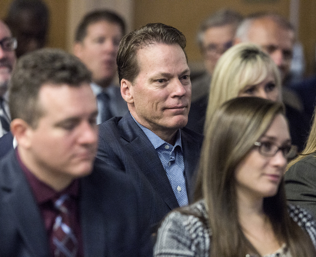 Craig Cavileer, center, executive vice president of Majestic Realty, listens during public comment at the Southern Nevada Tourism Infrastructure Committee Thursday, Aug. 25, 2016, at the Stan Fult ...