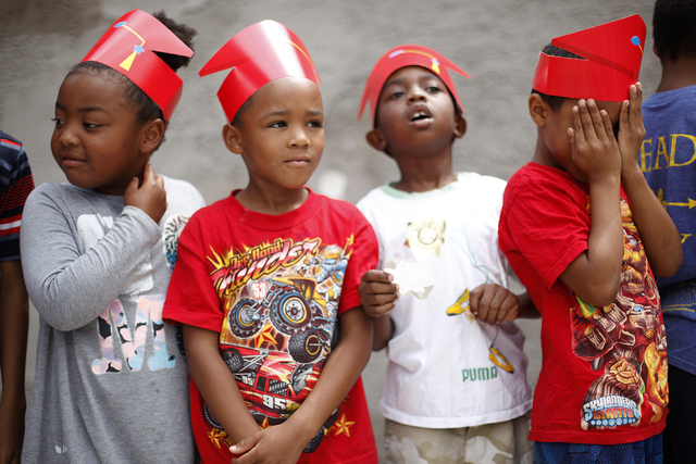 Layla Smothers, from left, Joesiah Johns, Victor McPhaul-Burton, and Cameron Howard wait in line on graduation day at the STARS summer camp on Friday, Aug. 19, 2016, in Las Vegas. Rachel Aston/Las ...