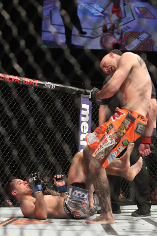 Donald Cerrone lands a kick to the leg of Myles Jury during their fight at UFC 182 Saturday, Jan. 3, 2015 at the MGM Grand Garden Arena.Cerrone won a unanimous decision. (Sam Morris/Las Vegas Revi ...