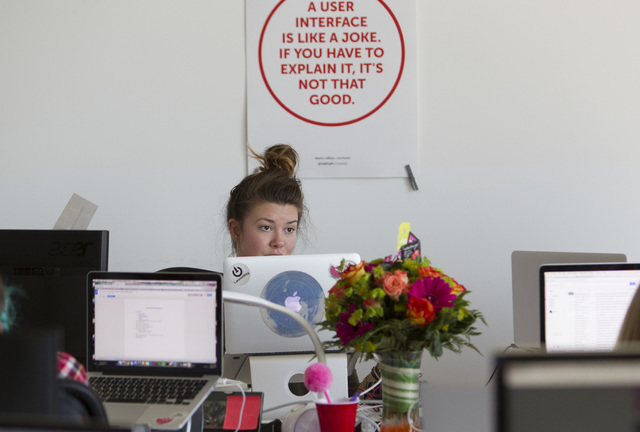 Influentialճ director of campaign management Bethany Davis speaks to a colleague while working in a Soho Lofts penthouse in downtown Las Vegas on Monday, Aug. 15, 2016. Richard Brian/Las Veg ...