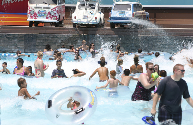 Swimmers cool off on a hot day at Surf-A-Rama Wave Pool at Cowabunga Bay Water Park in Henderson, Saturday, June 27, 2015. An excessive heat warning will be in effect until 9 p.m. as temperatures  ...