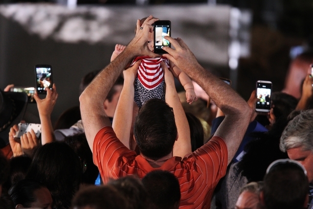 Supporters take photos as democratic presidential candidate Hillary Clinton leaves the stage at Springs Preserve in Las Vegas Wednesday, Oct. 14, 2015. Erik Verduzco/Las Vegas Review-Journal Follo ...