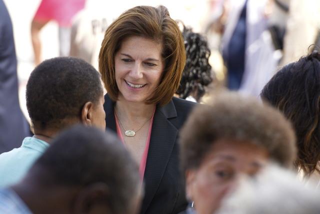 U.S. Senate candidate and former Nevada Attorney General Catherine Cortez Masto speaks with people during the dedication of the rehabilitated historic Westside School Saturday, Aug. 27, 2016. (Sam ...