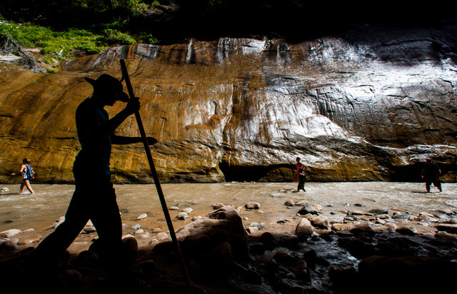 People walk along the Virgin River while hiking the Narrows at Zion National Park in Utah on Labor Day, Monday, Sept. 7, 2015. Chase Stevens/Las Vegas Review-Journal Follow @csstevensphoto