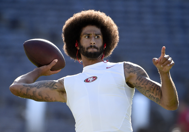 San Francisco 49ers quarterback Colin Kaepernick warms up for the team's NFL preseason football game against the San Diego Chargers, Thursday, Sept. 1, 2016, in San Diego. (Denis Poroy/AP)
