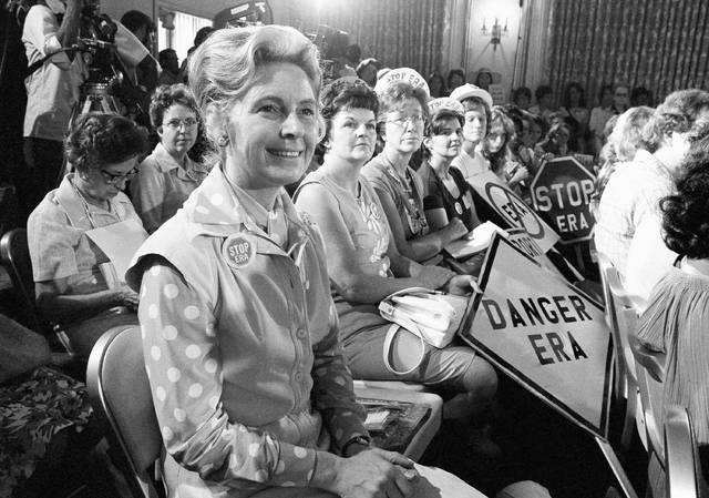 Women opposed to the Equal Rights Amendment sit with Phyllis Schlafly, left, national chairman of Stop ERA, at hearing of Republican platform subcommittee on human rights and responsibilities in a ...