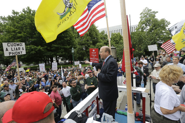 In this June 11, 2013, file photo, Assemblyman Bill Nojay speaks during a gun-rights rally in Albany, New York. Days after killing himself, a vocal advocate for gun rights and supporter of Donald ...